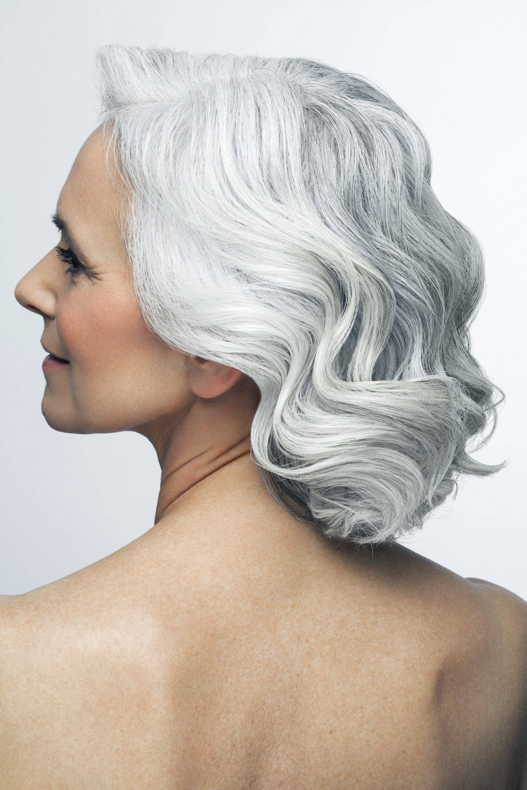 A woman with with an old Hollywood haircut | Source: Getty Images