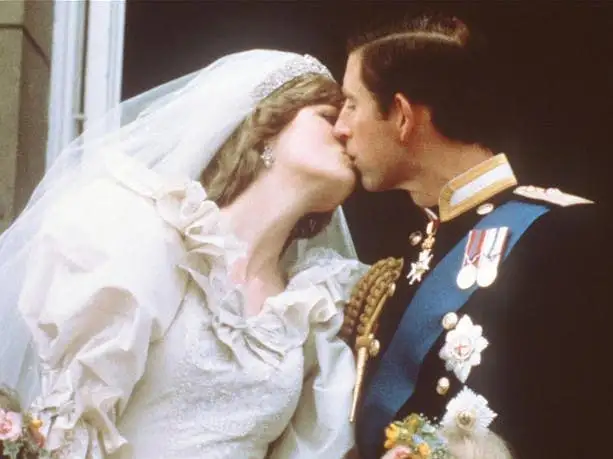 Princess Diana and Prince Charles kiss