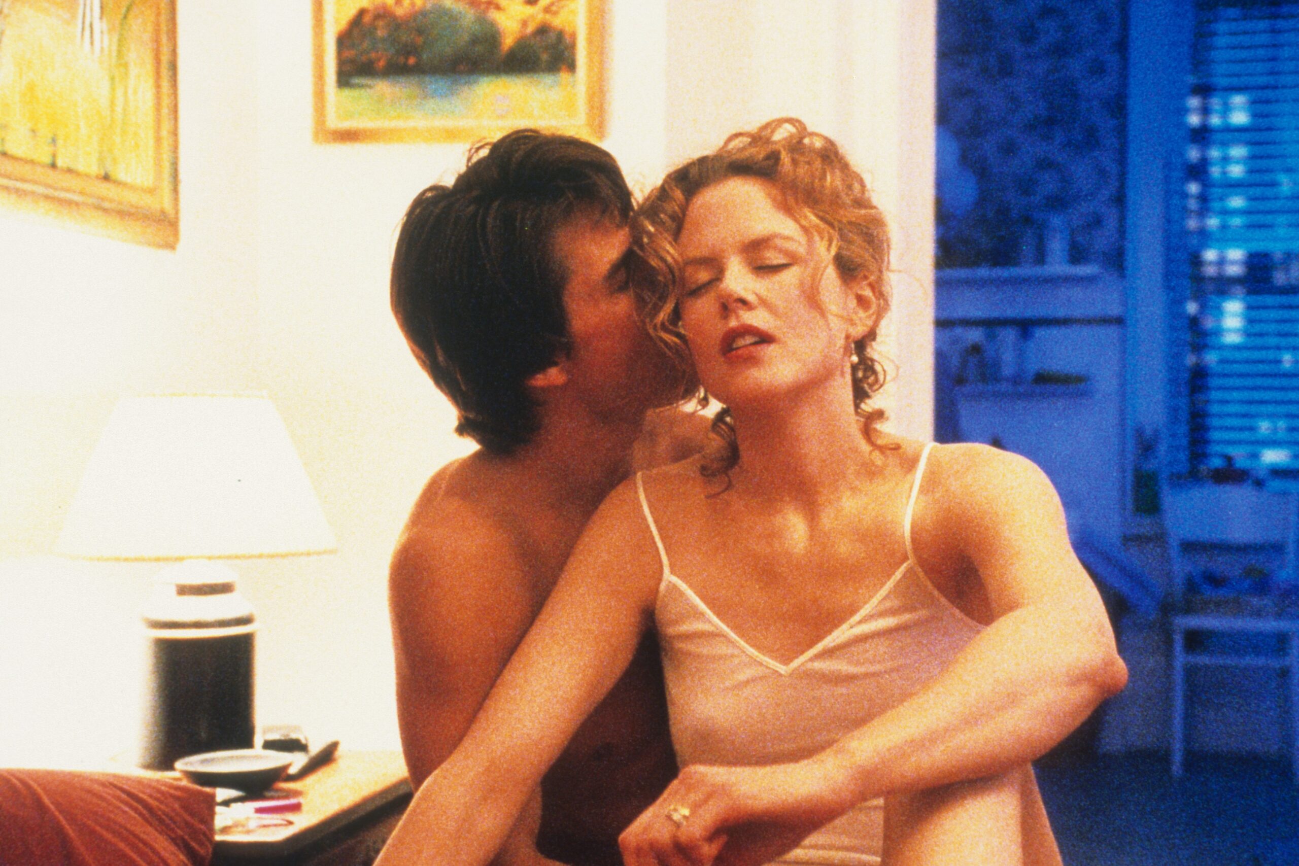 Tom Cruise kissing Nicole Kidman in a scene from the film 'Eyes Wide Shut', 1999 | Source: Getty...<div class=