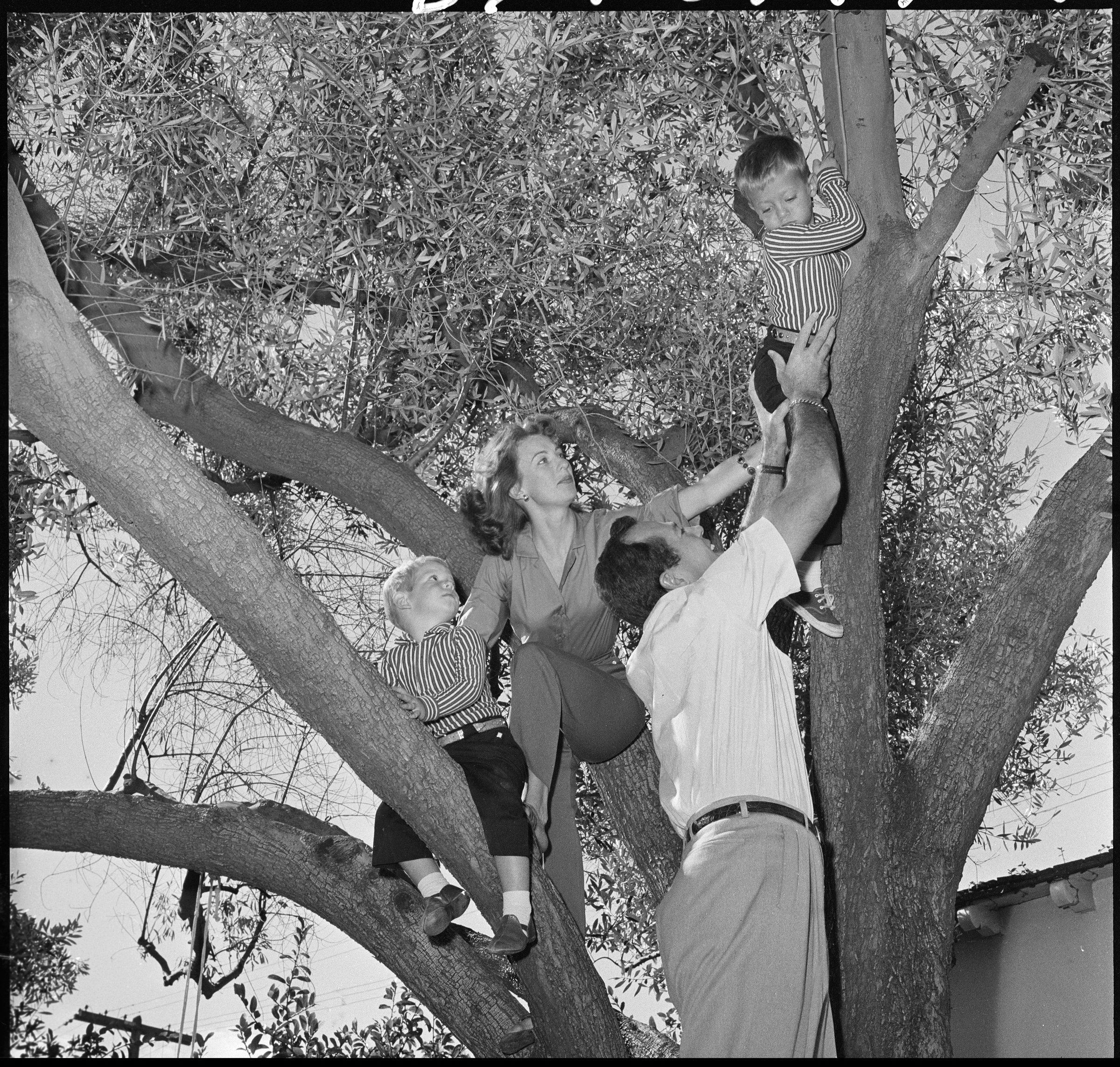 Cloris Leachman and George Englund with their sons Bryan (L) and Adam (R) on October 29, 1957. / Source: Getty Images