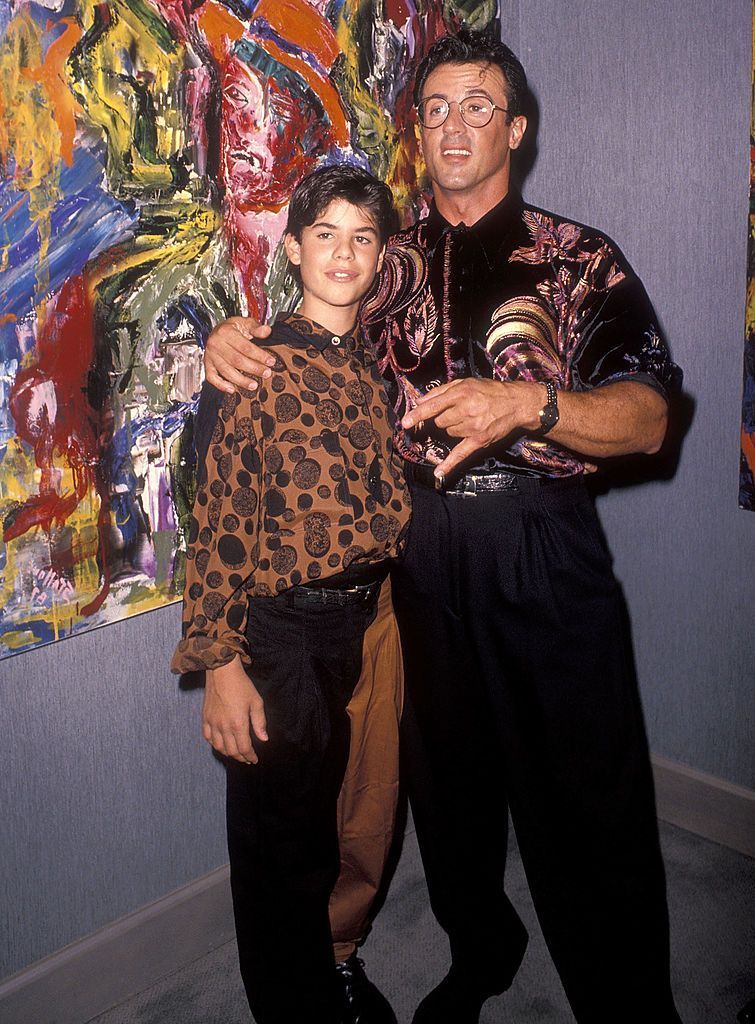 Sylvester Stallone and Sage at the Sylvester Stallone's Paintings Opening Night Exhibition and Cocktail Reception on September 10, 1990 at Hanson Galleries in Beverly Hills, California. | Source: Getty Images